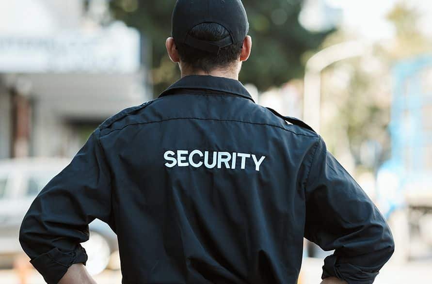 Unarmed security guard patrolling a commercial property