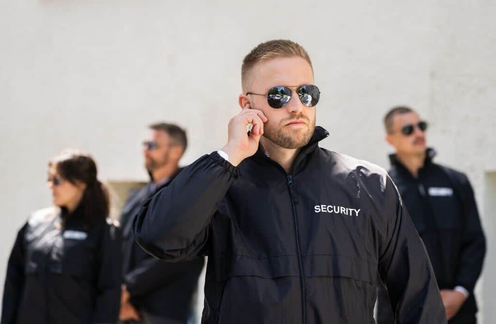 Unarmed security guards monitoring a parking area