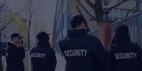 Unarmed security guards observing suspicious activity
